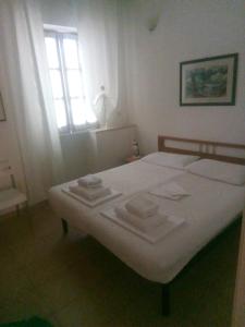 Posteľ alebo postele v izbe v ubytovaní Villa Oleandro Ciccino + 20 fotografií