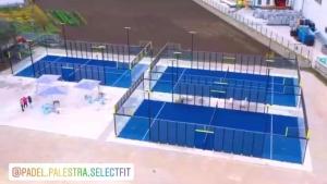 an overhead view of a tennis court next to the water at Hotel Select in Atessa