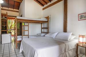 Voodi või voodid majutusasutuse Novos Baianos Hostel e Pousada toas +84 fotot