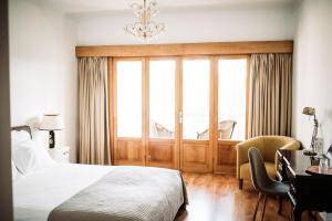 Ένα ή περισσότερα κρεβάτια σε δωμάτιο στο Quinta do Paço Hotel +73 φωτογραφίες