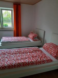Ένα ή περισσότερα κρεβάτια σε δωμάτιο στο Traumwohnung in Feldrandlage