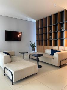 Televízia a/alebo spoločenská miestnosť v ubytovaní ШПИЦІ Hotel & SPA
