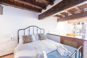 Posteľ alebo postele v izbe v ubytovaní Elegant Pantheon Suite