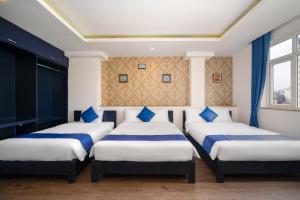 Postel nebo postele na pokoji v ubytování Alibaba Hotel by THG