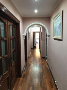 an empty hallway with an archway in a house at Los Girasoles in Fuengirola