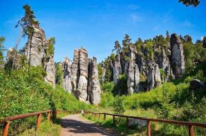 a path in front of a rocky mountain at W apartmán 2 in Teplice nad Metují