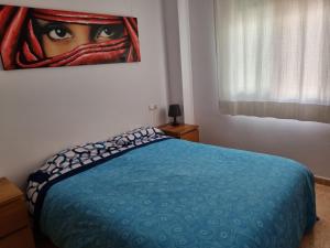 A bed or beds in a room at Hello Oliva Beach Ana