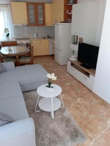Kuchyň nebo kuchyňský kout v ubytování Apartments Šime