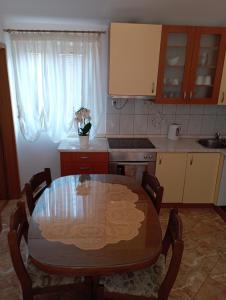 Kuchyň nebo kuchyňský kout v ubytování Apartments Šime