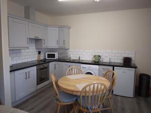 A kitchen or kitchenette at Old School House Belcoo (43)