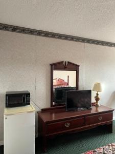 TV a/nebo společenská místnost v ubytování magnolia inn
