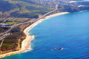 an aerial view of a beach and the ocean at Crescent Bay Inn in Laguna Beach