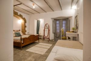 Letto o letti in una camera di Mascot Boutique Hotel