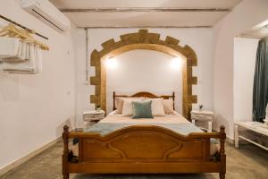 Letto o letti in una camera di Mascot Boutique Hotel