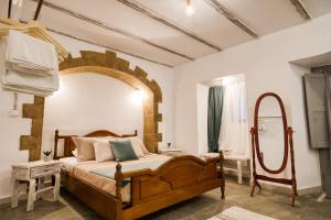 Letto o letti in una camera di Mascot Boutique Hotel