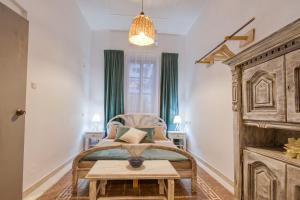 Letto o letti in una camera di Mascot Boutique Hotel