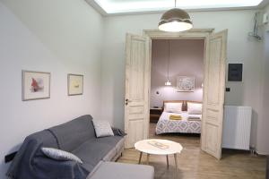Χώρος καθιστικού στο Όμορφο διαμέρισμα σε διατηρητέο κτίσμα στην Αθήνα
