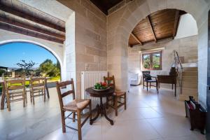 A seating area at FOS residence - ΦΩΣ ,luxury villa