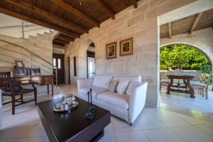 A seating area at FOS residence - ΦΩΣ ,luxury villa