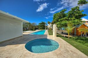 Πισίνα στο ή κοντά στο Amazing ocean view apartment with grand pool