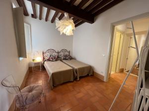 Letto o letti in una camera di San Giorgio Suite