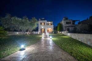 A garden outside FOS residence - ΦΩΣ ,luxury villa