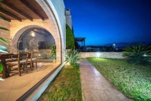A garden outside FOS residence - ΦΩΣ ,luxury villa