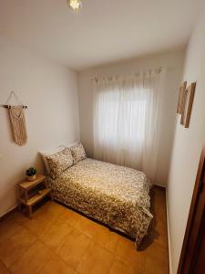 Postel nebo postele na pokoji v ubytování Apartamento Vega Conil