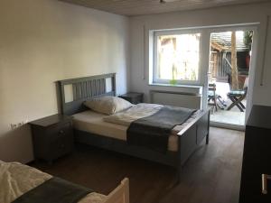 Кровать или кровати в номере Oxtown City Apartment