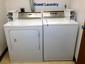 two machines are sitting next to each other in a room at Budget Host Caribou Inn in Hallock +2 photos