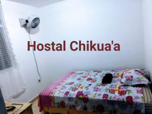 Voodi või voodid majutusasutuse Hostal Chikuaa toas