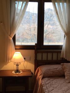 Postel nebo postele na pokoji v ubytování Casa Rural Fuentecillas