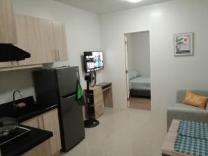 TV a/nebo společenská místnost v ubytování Brookridge Suites