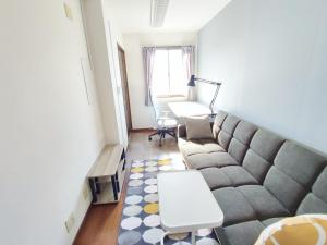 Posezení v ubytování ゲストハウスTSUU小田原 Guest House Tsuu Odawara #OD1