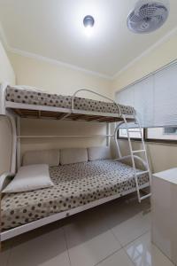 Ένα ή περισσότερα κρεβάτια σε δωμάτιο στο Praia do Forte - Condomínio Forte da Praia +19 φωτογραφίες