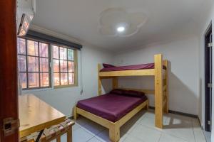 Postelja oz. postelje v sobi nastanitve Sundaze Homestay