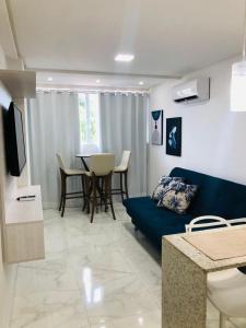 Μια τηλεόραση ή/και κέντρο ψυχαγωγίας στο Residencial Makambira, Aconchegante e completo.