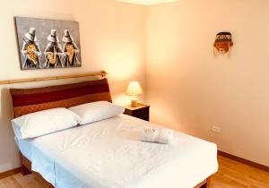 Ένα ή περισσότερα κρεβάτια σε δωμάτιο στο Casa Porta