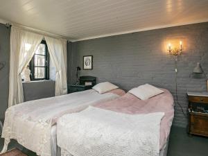 Postel nebo postele na pokoji v ubytování Holiday home Løkken CLXVI