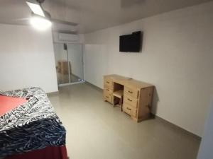 TV a/nebo společenská místnost v ubytování Room in Guest room - Piscalonga Hotel Restaurant Cozy Family Operated
