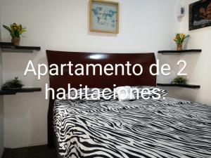 Katil atau katil-katil dalam bilik di Cómodos y acogedores Apartaestudios - Manizales