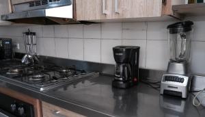 Kuchyň nebo kuchyňský kout v ubytování Casa La Palma Habitación Cielo