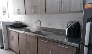 Kuchyň nebo kuchyňský kout v ubytování Casa La Palma Habitación Cielo