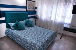 Postel nebo postele na pokoji v ubytování Casa La Palma Habitación Cielo