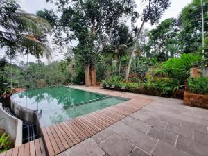 Bazén v ubytování Willow Resorts Wayanad nebo v jeho okolí