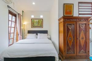 Katil atau katil-katil dalam bilik di Omah Gerjen 29 by Bukit Vista