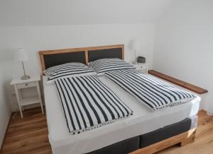 Voodi või voodid majutusasutuse Attwengerhof toas