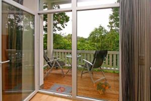 Ein Balkon oder eine Terrasse in der Unterkunft Villa Seestern, App. 3