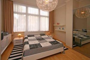 Ein Bett oder Betten in einem Zimmer der Unterkunft Villa Seestern, App. 3