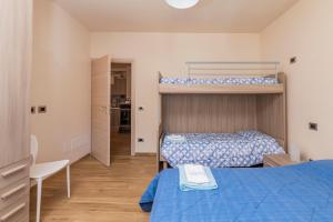 Ένα ή περισσότερα κρεβάτια σε δωμάτιο στο Europa Master Guest apartment